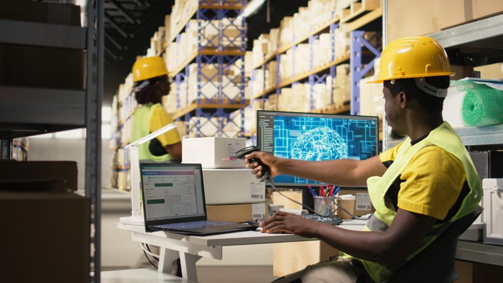 Black,Worker,Scanning,To,Register,Shipping,Labels,Tracking,Info,With